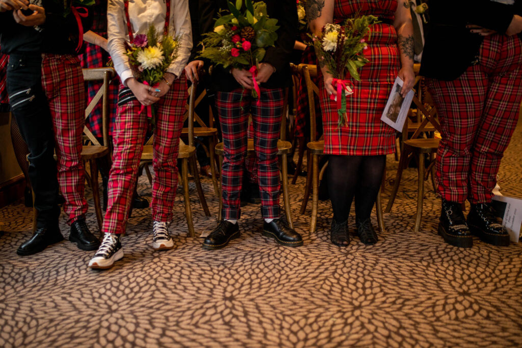 photo of wedding guests wearing boots, converse trainers and cool trousers!